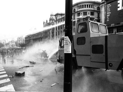 A police water cannon is deployed against students protesting against the Socialist government's education policies in 1987.