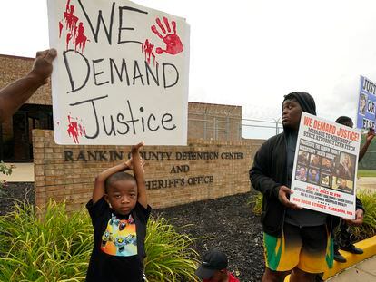 An anti-police brutality activist protests in front of the Rankin County Sheriff's Office in Brandon, Mississippi, on July 5, 2023.