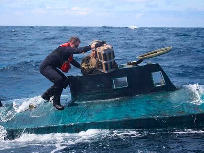 The U.S. Coast Guard boards a semi-submersible boat, which was carrying cocaine that had a market value of more than $165 million, in September 2019.