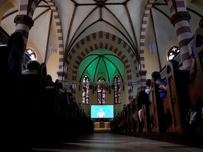 People attend a church service in Nuremberg, Germany, Friday, June 9, 2023.