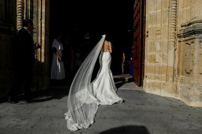 A castle, a bell-tower, a warren of twisting streets, orange blossom, geraniums and silence: stereotype and reality meet often in these white villages. Pictured here is a bride entering a church in the village of Espera.
