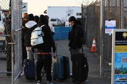 A group migrants arrive at the temporary shelter set up at the Brooklyn terminal on February 2. 