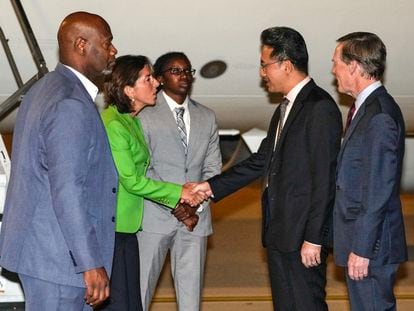 US Secretary of Commerce Gina Raimondo (2-L) shakes hands with China's Ministry of Commerce Director General Lin Feng (2-R), next to U.S. Ambassador to China Nicholas Burns (R), as she arrives at the Beijing Capital International Airport in Beijing, China, 27 August 2023.