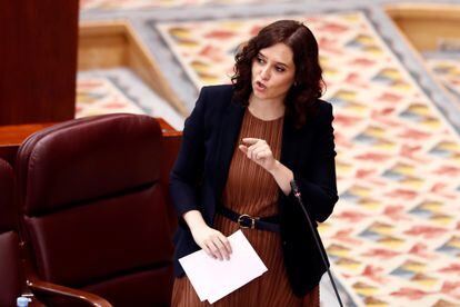 Madrid premier Isabel Díaz Ayuso inside the regional assembly on Thursday.