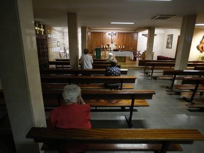 Worshipers pray at a chapel in Madrid.