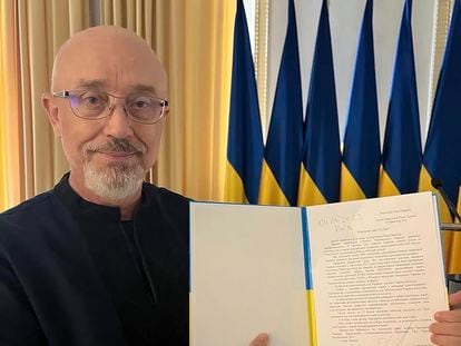 The former Minister of Defense, Oleksii Reznikov, shows his resignation letter in an image provided by the Ukrainian Parliament.