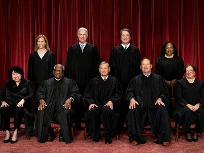 U.S. Supreme Court justices Amy Coney Barrett, Neil M. Gorsuch, Brett M. Kavanaugh, Ketanji Brown Jackson, Sonia Sotomayor, Clarence Thomas, Chief Justice John G. Roberts, Jr., Samuel A. Alito, Jr. and Elena Kagan pose for their group portrait at the Supreme Court in Washington, U.S., October 7, 2022.