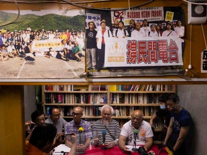 "The Bull" Tsang Kin-shing, right, founder of Hong Kong's pro-democracy Citizens' Radio station along with guests hold their last broadcast in Hong Kong, Friday, June 30, 2023.