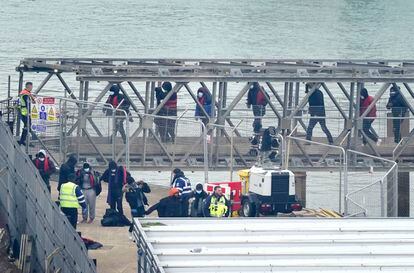 A group of people thought to be migrants are brought in to Dover, Kent, onboard a Border Force vessel following a small boat incident in the Channel, England, Monday March 6, 2023.