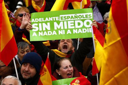 “Onward Spaniards – No fear of anything nor anyone,” reads this banner held by a protester at Sunday’s rally in Madrid.