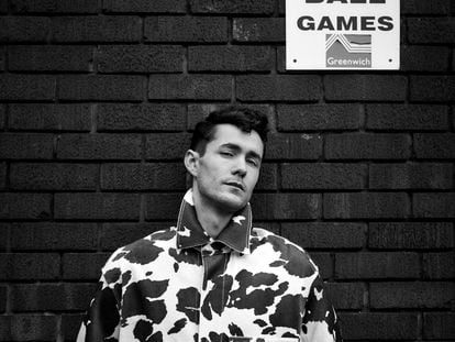 Jonah Hauer-King wears a cow print jacket by Fendi.