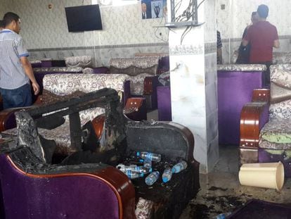 Slideshow: The inside of the café after the attack.
