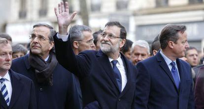 Rajoy (center) with Samaras (left) and British PM David Cameron during the march in Paris.