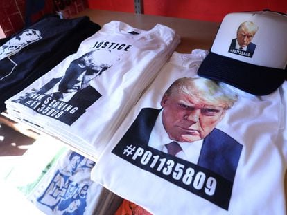 T-shirts and hats with an image depicting the mugshot of former U.S. President Donald Trump are pictured after being printed at the Y-Que printing store in Los Angeles, California, U.S., August 26, 2023