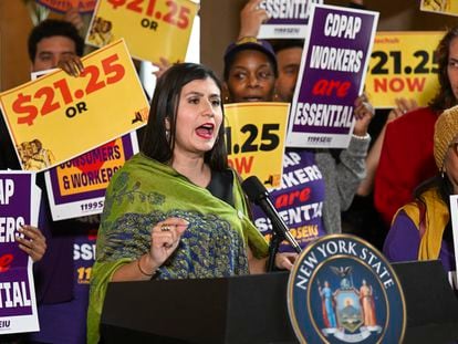 New York Senator Jessica Ramos stands with protesters urging lawmakers to raise New York's minimum wage during a rally at the state Capitol, on March 13, 2023, in Albany, New York.