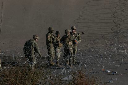 National Guard troops patrol the US border with Mexico.