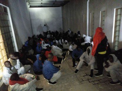 Migrants crowd in a police station in Algeciras.