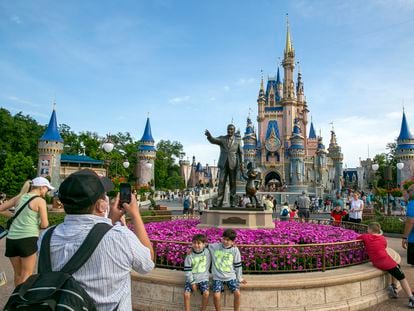 People visit the Magic Kingdom Park at Walt Disney World Resort in Lake Buena Vista, Fla., April 18, 2022.