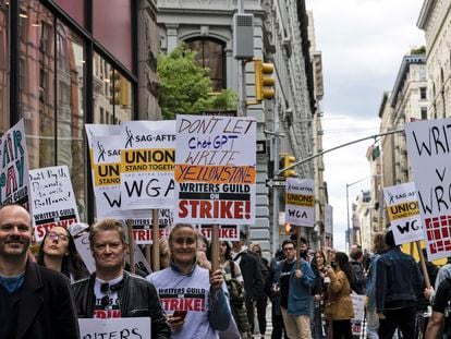 Members of the Writers Guild of America union picket outside Netflix headquarters near Union Square, Wednesday, May 3, 2023, in New York.