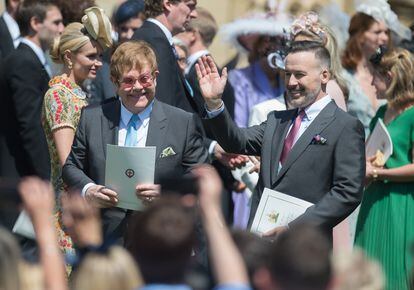 Elton John and David Furnish at the wedding of Prince Harry and Meghan Markle, at St. George's Church, Windsor Castle, May 19, 2018. 