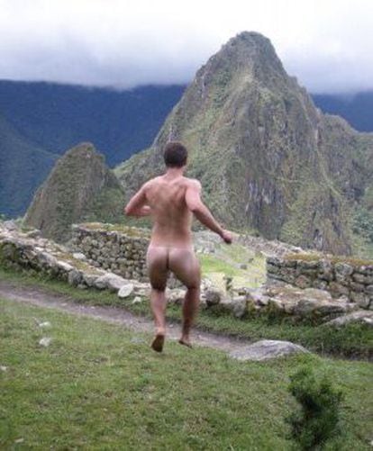 A man poses nude at Machu Picchu, in an image taken from the Facebook page "Naked in monuments."