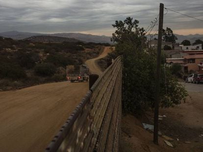 The fence at the border town of Tecate. On the left, Mexico.