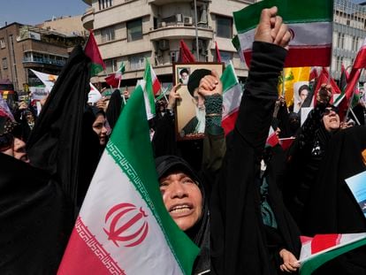 Iranian worshippers chant slogans during an anti-Israeli gathering after Friday prayers in Tehran, Iran, April 19, 2024.