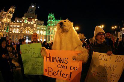 A protester dressed up as a polar bear takes part in the march, which passed by Madrid City Hall.
