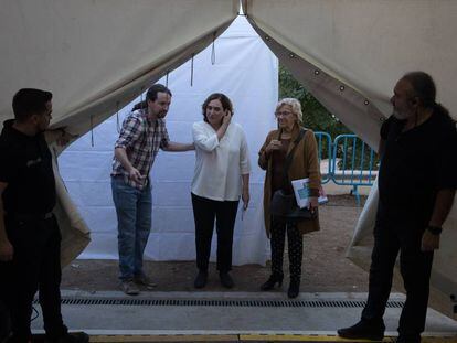 Ada Colau, Pablo Iglesias and Manuela Carmena in an event to establish Podemos as a political party.