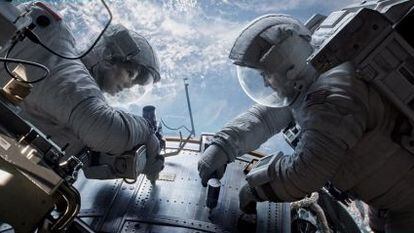 Sandra Bullock and George Clooney in Alfonso Cuarón's Gravity.