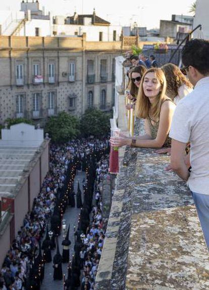 On-lookers of a Holy Week procession in Seville.