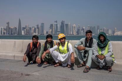 Pakistani migrant workers take a break in Doha, Qatar on Wednesday.