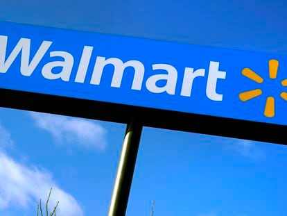 In this Nov. 18, 2020 file photo, a Walmart store sign is visible from Route 28 in Derry, N.H.  Walmart reports their financial earnings on Tuesday, Feb. 21, 2023.