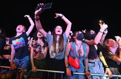 People cheer as Coldplay perform during the 2021 Global Citizen Live festival at the Great Lawn, Central Park.