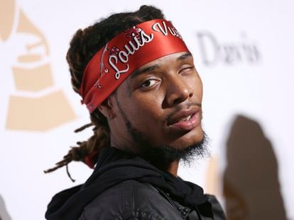 Fetty Wap arrives at the 2016 Clive Davis Pre-Grammy Gala at the Beverly Hilton Hotel, Feb. 14, 2016, in Beverly Hills, Calif.