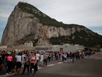 People crossing Gibraltar airport.
