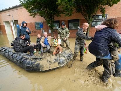 People are rescued in Faenza, Italy, Thursday, May 18, 2023.