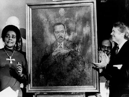 Coretta Scott King, widow of slain civil rights leader Martin Luther King Jr., speaks at an unveiling of a portrait of King by artist George Mandus, Feb. 18, 1974, and dedicated by Gov. Jimmy Carter.