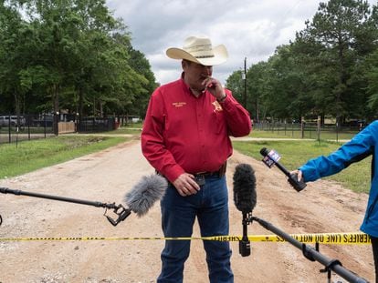 San Jacinto County Sheriff Greg Capers speaks to the media outside of a crime scene where five people, including an 8-year-old child, were killed after a shooting inside a home on April 29, 2023 in Cleveland, Texas.