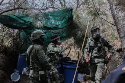 Members of the Mexican Army dismantle a chemical drug laboratory on the border of the mountains of Nayarit and Sinaloa.
