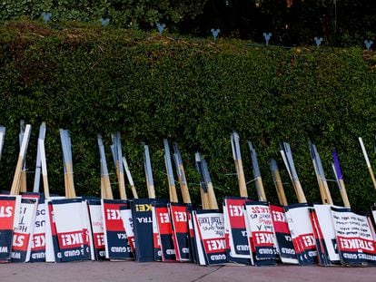 Strike signs await striking SAG-AFTRA actors and Writers Guild of America (WGA) outside Disney Studios in Burbank, California, on July 25, 2023.