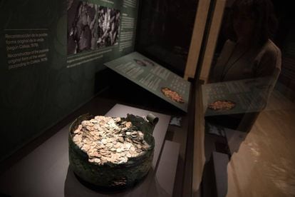 The restored cauldron with more than 8,000 coins at the National Archaeology Museum.
