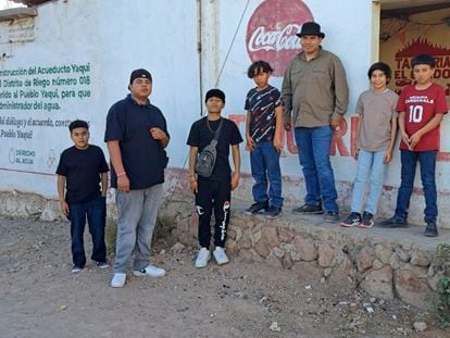 Members of the Pascua Yaqui Tribe pose for a photo in their tribal community in Sonora, Mexico. in March, 2023.