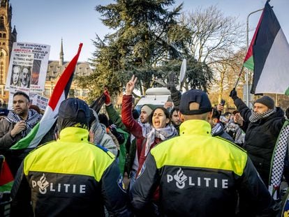 Police control pro-Palestinian protesters outside the UN International Court of Justice in The Hague on January 11.