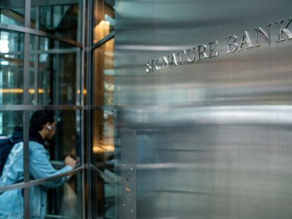 A person walks into the lobby of the Signature Bank headquarters, in New York City on March 13, 2023.