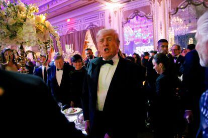 Former U.S. President Donald Trump, who announced a third run for the presidency in 2024, hosts a New Year's Eve party at his Mar-a-Lago resort in Palm Beach, Florida, U.S. December 31, 2022.