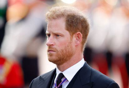 A shot of Prince Harry as he walks behind the gun carriage bearing the coffin of Queen Elizabeth II from Buckingham Palace to Westminster Palace on September 14, 2022, in London.