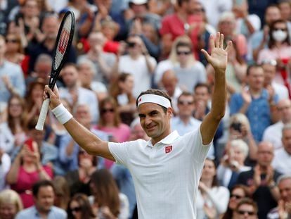 Federer celebrates winning second round match against Richard Gasquet at Wimbledon in 2021.