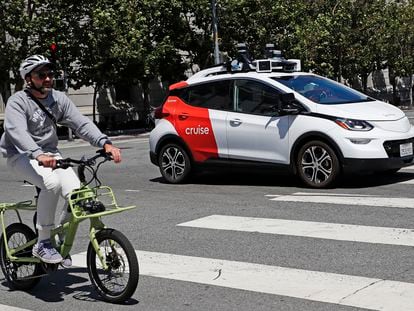 Cruise, a driverless robotaxi, drives on a street in San Francisco, California, USA, 11 August 2023.