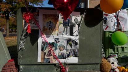 Images of Dominic Davis, an 11-year-old boy who was killed in a weekend shooting, are part of a makeshift memorial, Monday, Nov 6, 2023, in Cincinnati.